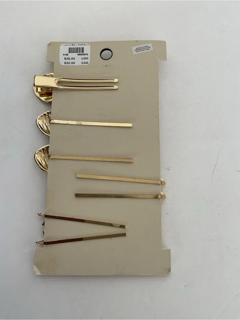 Anthropologie Gold she’ll hair clips NWT